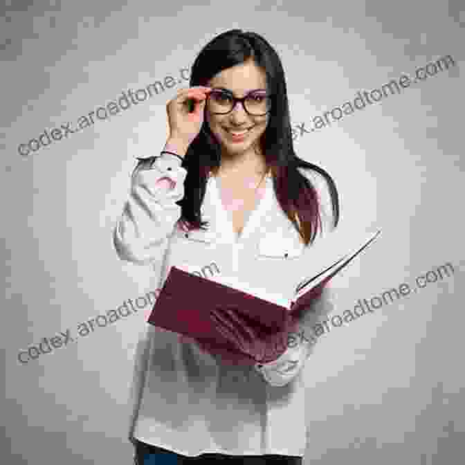 A Young Woman Holding A Book Featuring A Photograph Of A Cat Cats Photo VoL 2: Cat Photo Photography