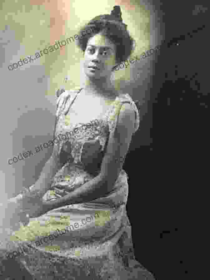 Alice Dunbar Nelson Writing At A Desk, Pen In Hand And Thoughtful Expression. Love Activism And The Respectable Life Of Alice Dunbar Nelson