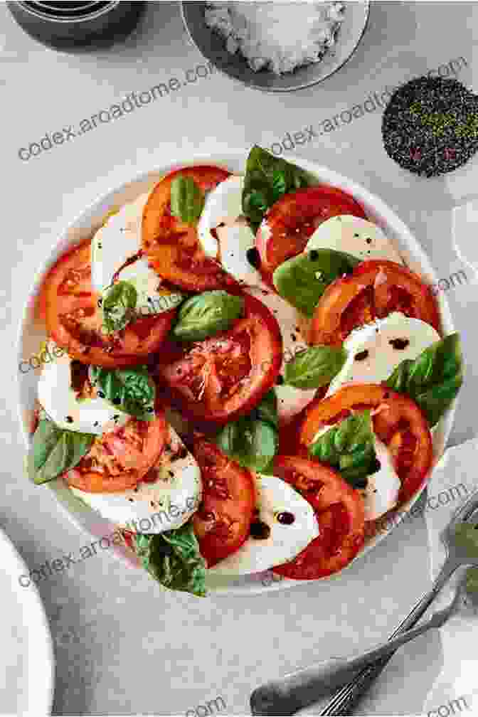 Caprese Salad With Ripe Tomatoes, Fresh Mozzarella, And Basil Leaves Mediterranean Diet Cookbook For Beginners: 130 Recipes Easy To Cook To Stay Fit And Follow A Healthy Eating Every Day 7 Day Meal Plan Included