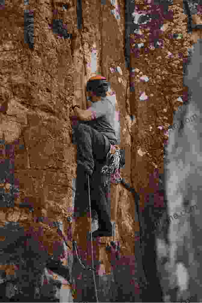 Climber Placing Trad Gear On A Natural Rock Face Advanced Rock Climbing: Mastering Sport And Trad Climbing